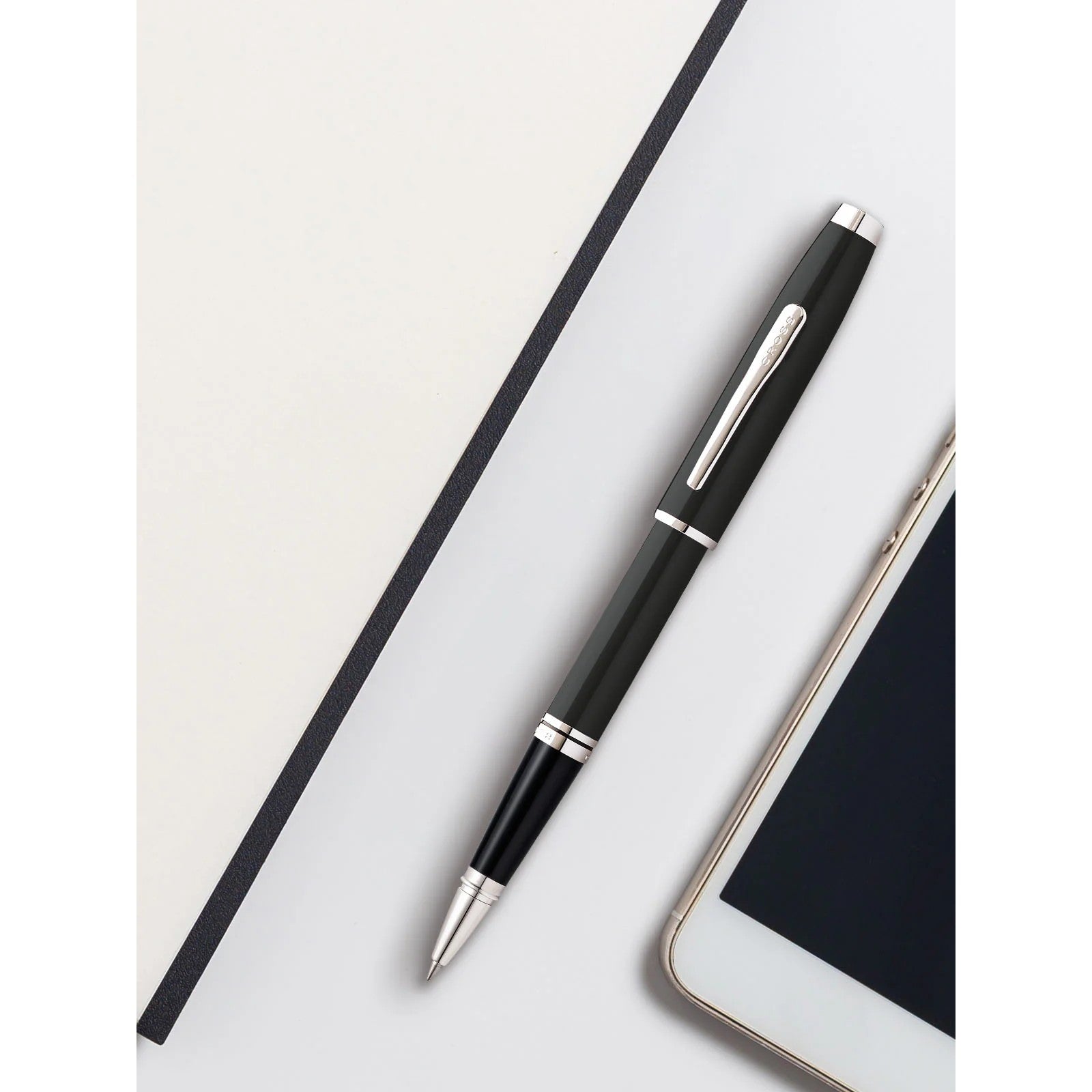 Black Cross pen with silver accents on a white surface